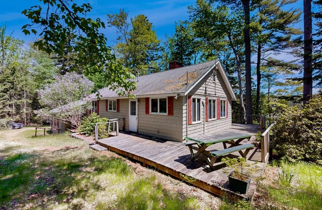 Charming Lakefront Retreat with Canoes, Kayaks, and Modern Comforts