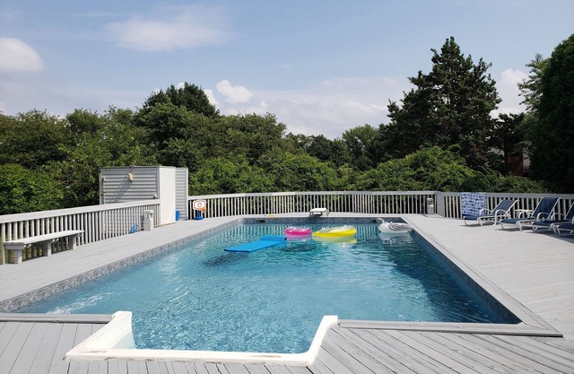 Charming updated home with pool on quiet street. Near Silver Beach