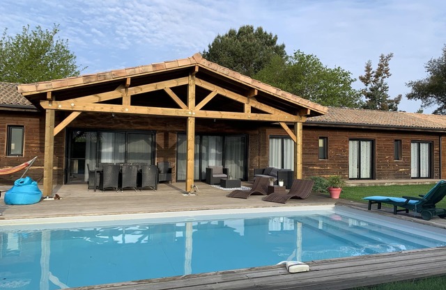 CHARMING WOODEN HOUSE ON ONE LEVEL WITH HEATED SWIMMING POOL