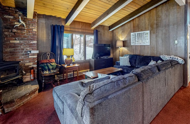 Chateau-Style Condo with WiFi, Wood Stove, Shared Pool/Hot Tub/Sauna/Tennis
