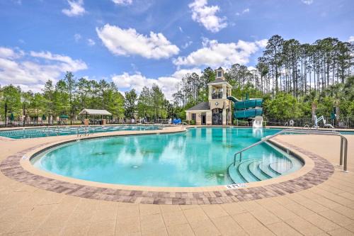 Cheery Condo with Community Pool and Waterslide!