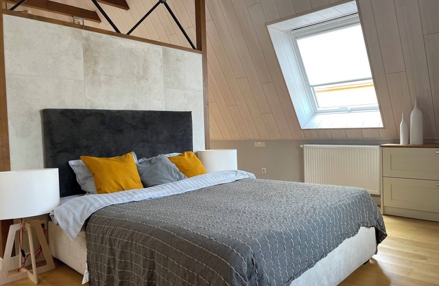 Chic Old Town Apartment with Soaring Ceilings and Modern Comforts