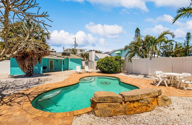 Colorful beach cottage w/heated private pool & grill area - dog-friendly