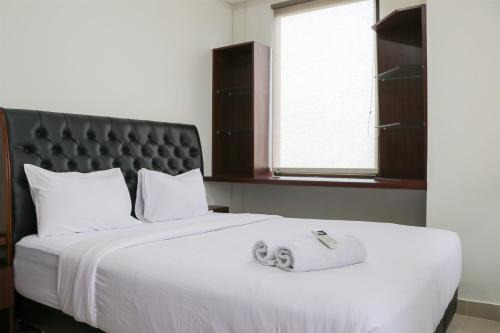 Comfort and Cozy Stay 2BR at 29th Floor Transpark Cibubur Apartment By Travelio