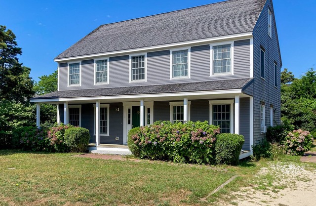 Comfortable home near beaches, town, & airport with patio, WiFi, grill, & W/D