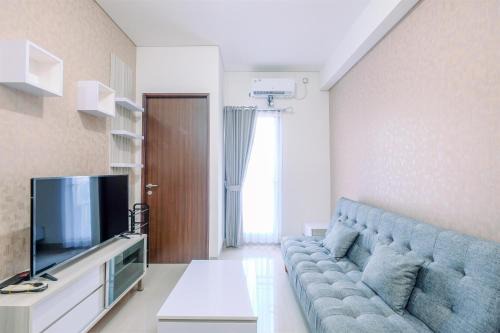 Comfy and Modern 2BR at Transpark Cibubur Apartment By Travelio