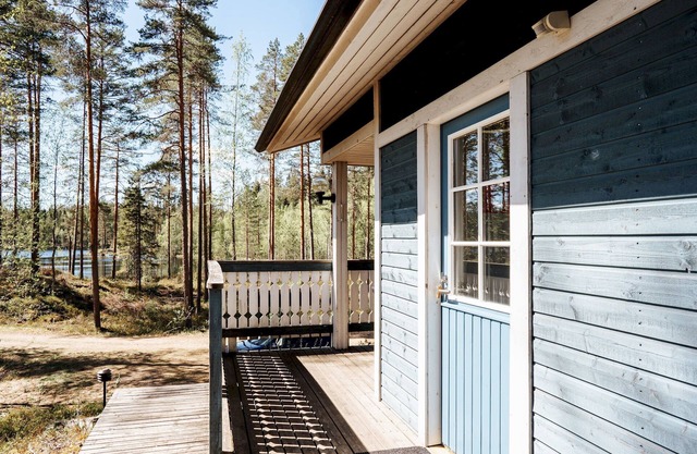 Cottage by lake, sauna and boat