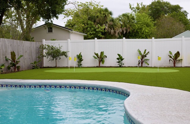 Cottage Home with Heated Pool and Screened in Porch.