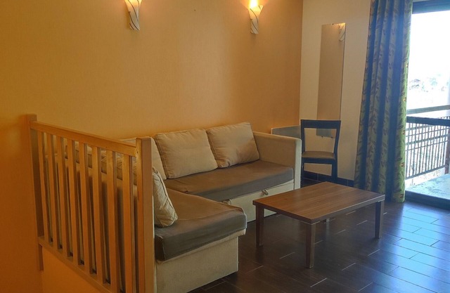 Cozy 2-Bedroom Apartment with Terrace, Indoor Pool Access, and Parking in Jausiers