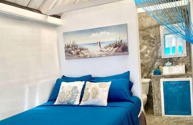 Cozy Beach Front bungalow #1. Unspoiled Beach.