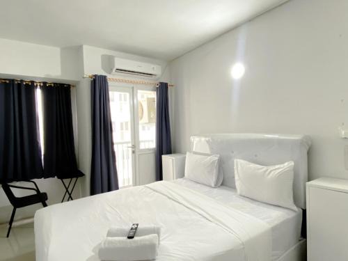 Cozy Living Studio Grand Sentraland Karawang Apartment By Travelio