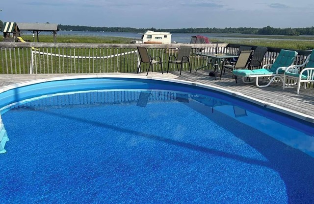 Cozy two bedroom cabin shores of Lake Nipissing. Enjoy the pool and lake views.