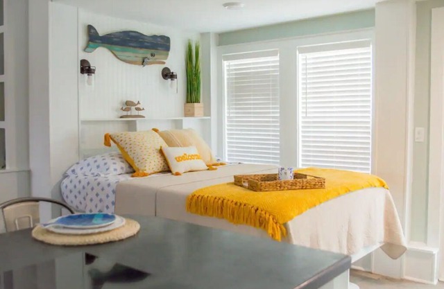 Cozy waterfront retreat with lighthouse view.