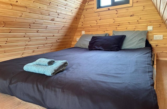 Cozy Wooden House with Kids' Playground!