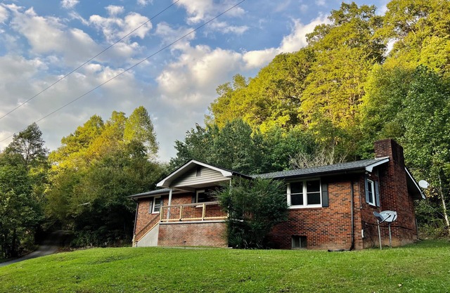 Creekview retreat by ATV trails and waterfalls! Stunning creek view from porch.