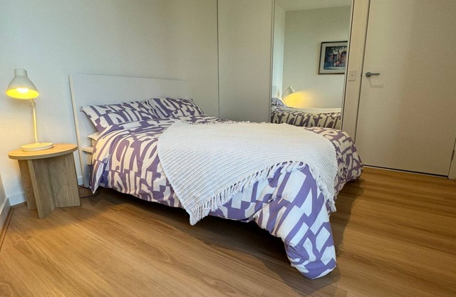 Cute bedroom in a shared apartment with private bathroom in Burwood Brickworks.