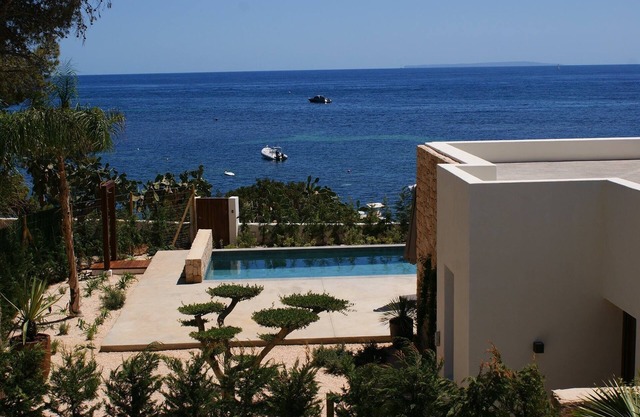 Delightful modern villa just 40 metres from the beachfront, close to Santa Eulal