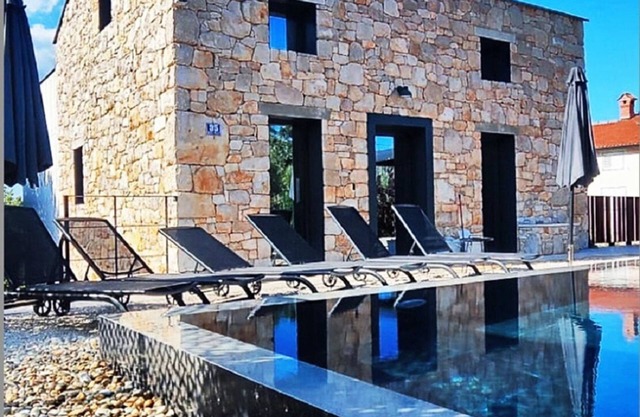 Design lovers stone house with stunning pool and a walking distance to the beach