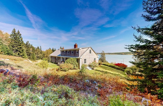 Dog-friendly oceanfront home with private beach, two fireplaces, & firepit