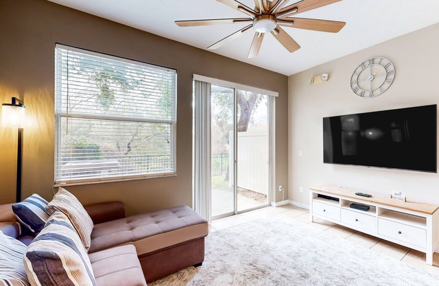 Dog-friendly townhouse near Disney with outdoor pool, patio, streaming, W/D, AC