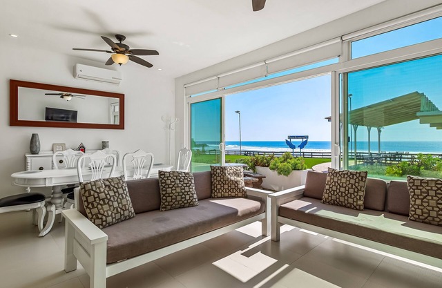 Dog-friendly villa with beach views, patio, outdoor pool, streaming, partial AC