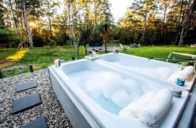 Dorrigo accommodation, twin outdoor baths under the stars,120 ac. river & walks