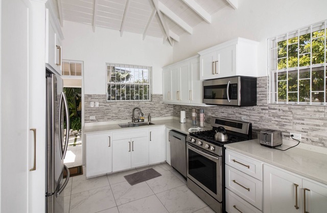 Dover Beach Coastal Cottage in lush private grounds.