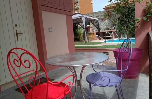 Downtown poolfront room with private veranda