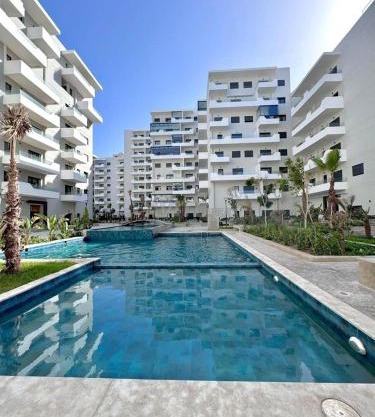 Duplex Luxe 3 Chambres Vue Mer & Piscine à Zenata Eco City