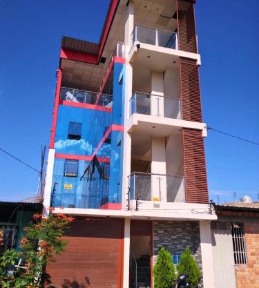 Edificio Rojo Departamentos.