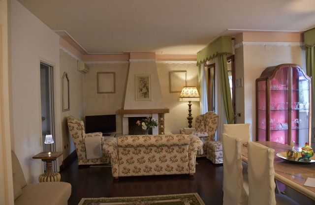 Elegant apartment with large terraces in quiet residential area.
