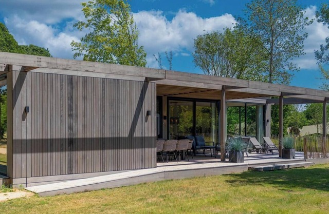 Elegant forest villa with luxury kitchen, large terrace and three bedrooms – ideal for families or friends looking to relax in nature.