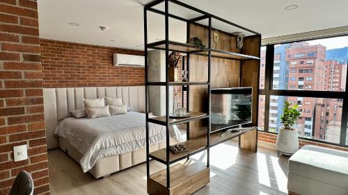 Encanto moderno en Laureles Medellin con vista y AC