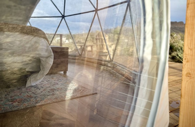 Enchanting Geodesic Dome with Mountain Views and natural desert surroundings.