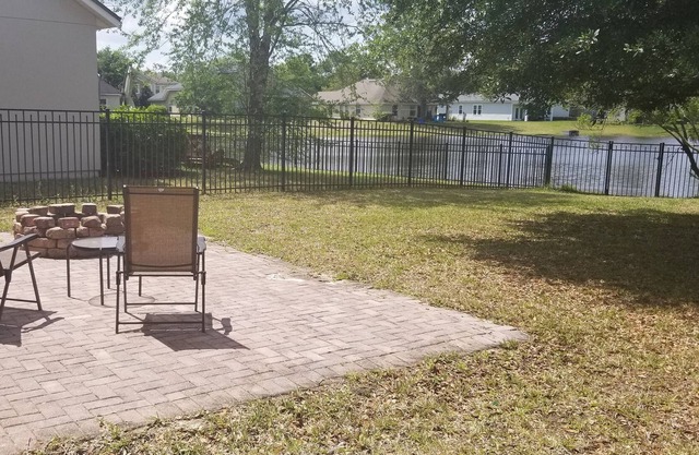 Enjoy a vast backyard with lake access,