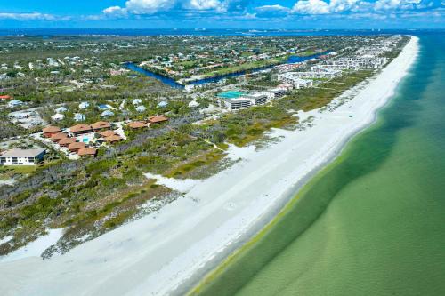 Enjoy pool views from your Sanibel Island Villa Private beach