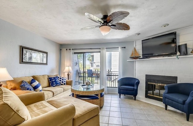 Enjoy this updated townhome with views of the gulf and pool from the deck.