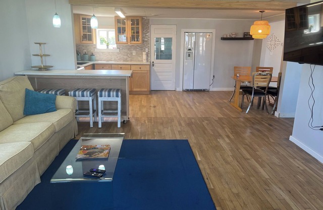 Enjoy views of beautiful Houghton Lake in charming LARGE home that sleeps 10.