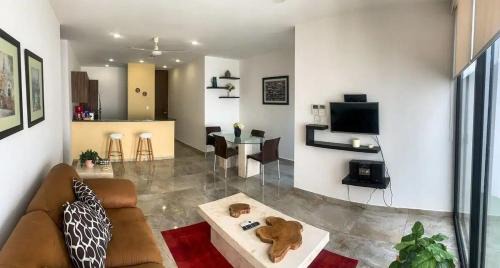 Espacioso y acogedor departamento con jardín