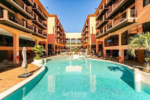 Estúdios Modernos em Resort pé na areia - Jurerê Beach Village JBVJR
