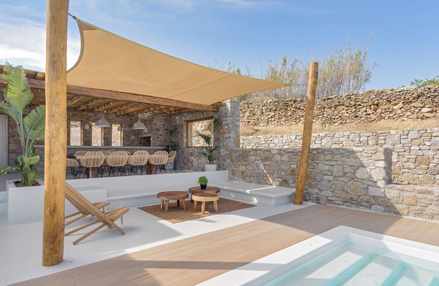 Experience luxurious living in this modern villa with stunning views