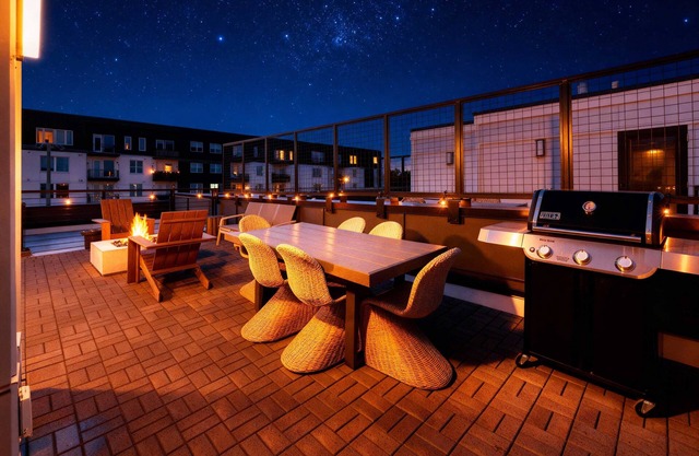 Fall rooftop fire pit, skyline views, chef's kitchen near Broadway