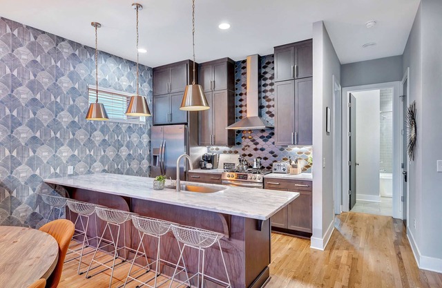 Fall rooftops, game rooms, BBQs, skyline views near Broadway & Nissan Stadium