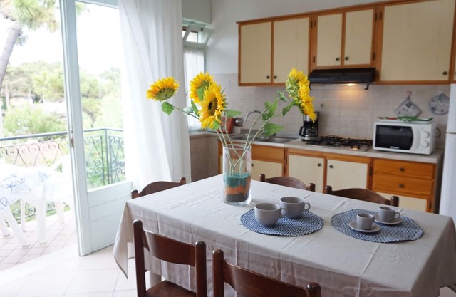 Fantastic flat in a quiet villa with terrace in Lignano Pineta by BeahostRentals