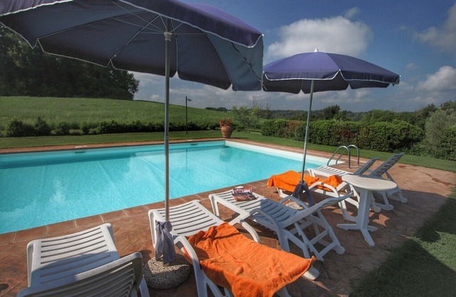Farmhouse on a hill with swimming pool, large garden and nice views