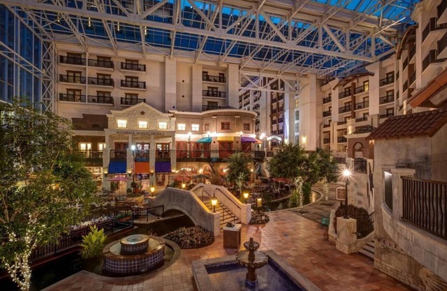 Featuring a 10-acre outdoor pool facility and a European-style spa .