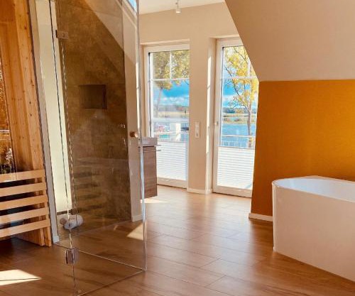 Ferienhaus Am Hafen 12 Altwarp mit Sauna, Kamin und Wasserblick