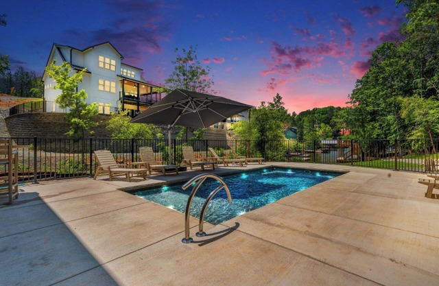 Firefly Estate, Lakefront Luxury w/Covered Verandas + Heated Salt Pool, Hot Tub, Dock!