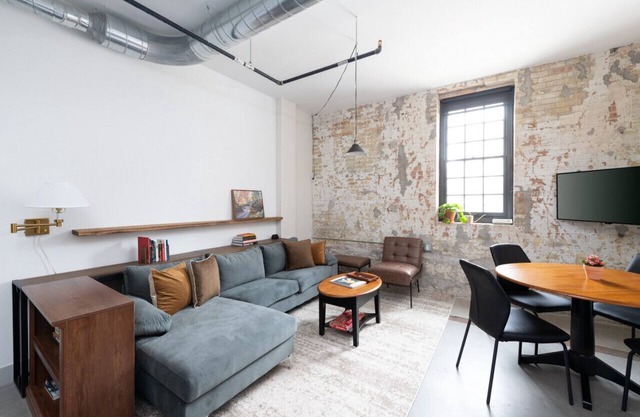 Flexhome Brewery District 2-Story 2BR Apt Near Fiserv with Rooftop, Gym, and Parking