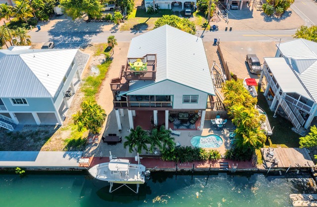 Foster`s Folly | Gorgeous canalfront pool home close to open water on Cudjoe Key